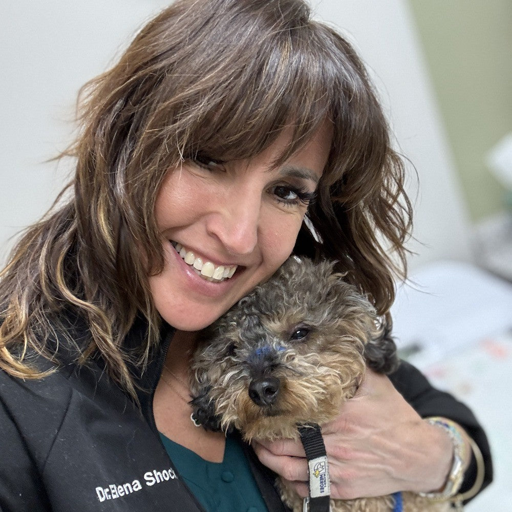 Dr. Elena Shockman, VMD, with her dog Rocco